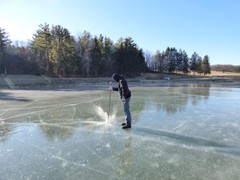 Checking the ice to make sure it is safe.
